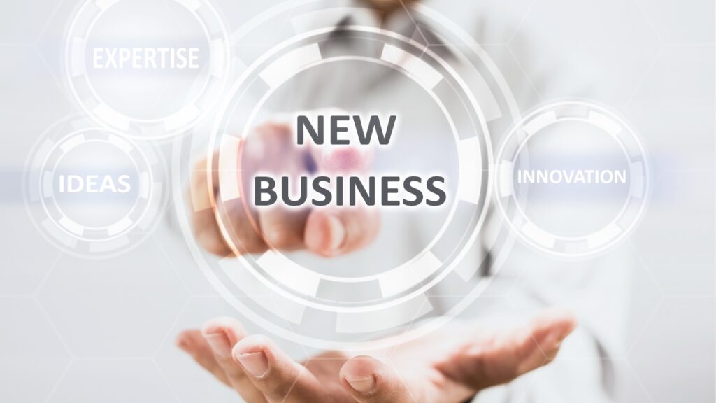 New Businessの文字と手