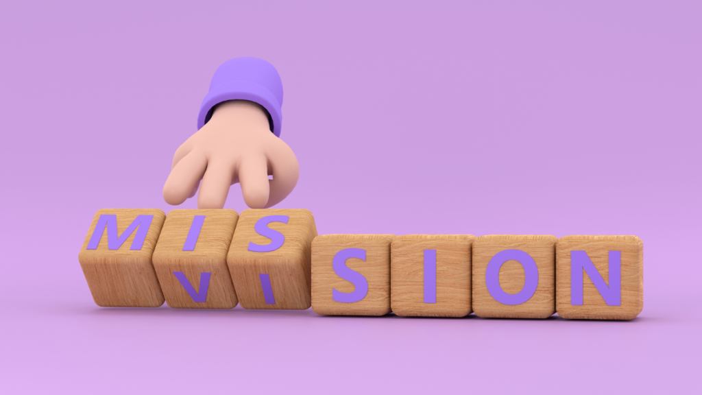 Mission, Visionの文字が書かれたサイコロを回す手