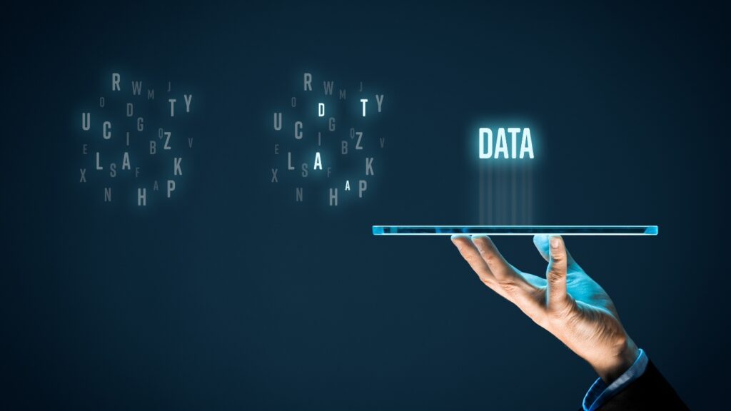端末を持つ手とDATAの文字