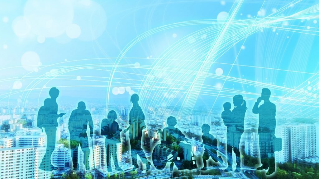 都市とデータとそこに住む人々のシルエット