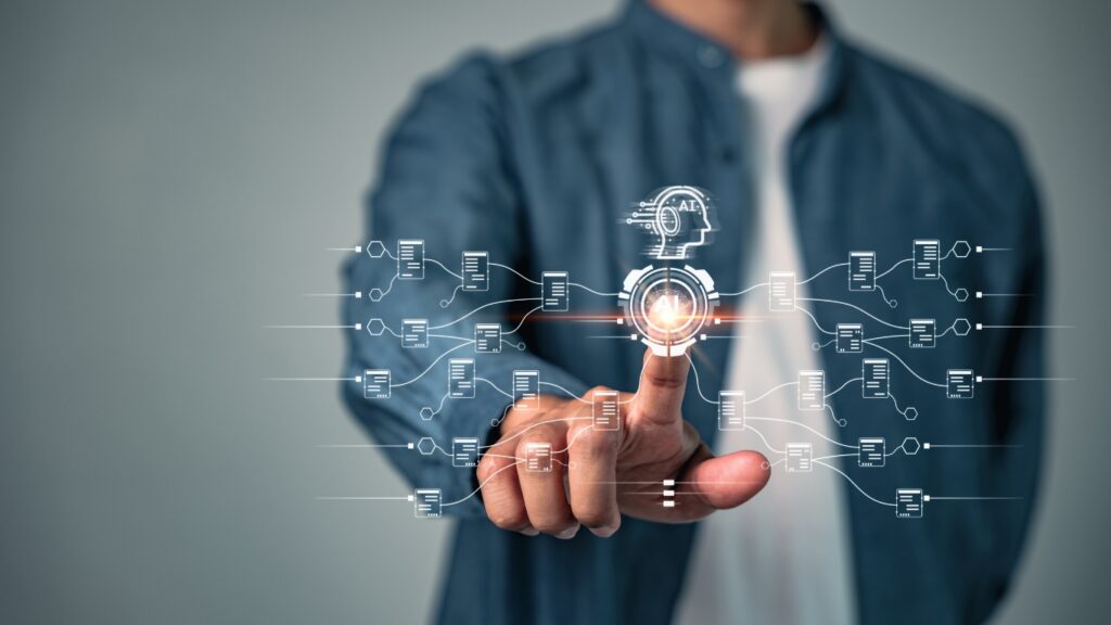 生成AIのアイコンに触れる男性の手